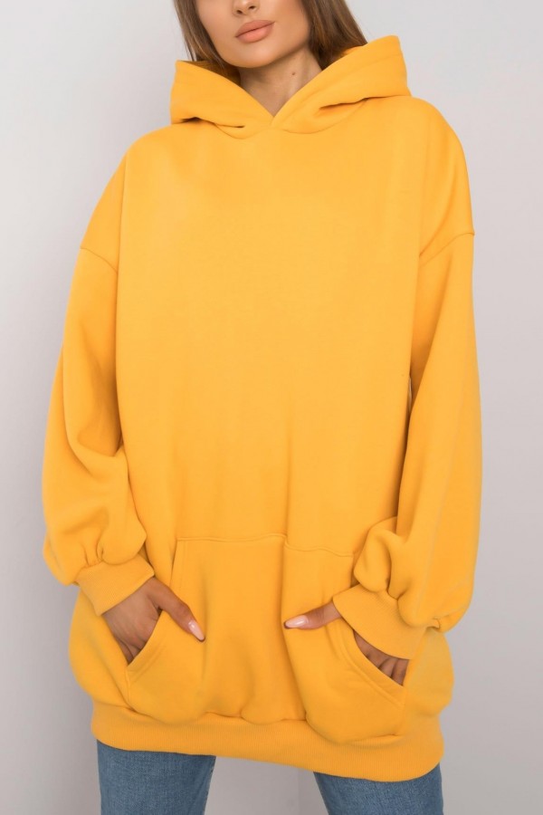 Ciepła milutka bluza tunika plus size z kapturem w kolorze żółtym Avatti