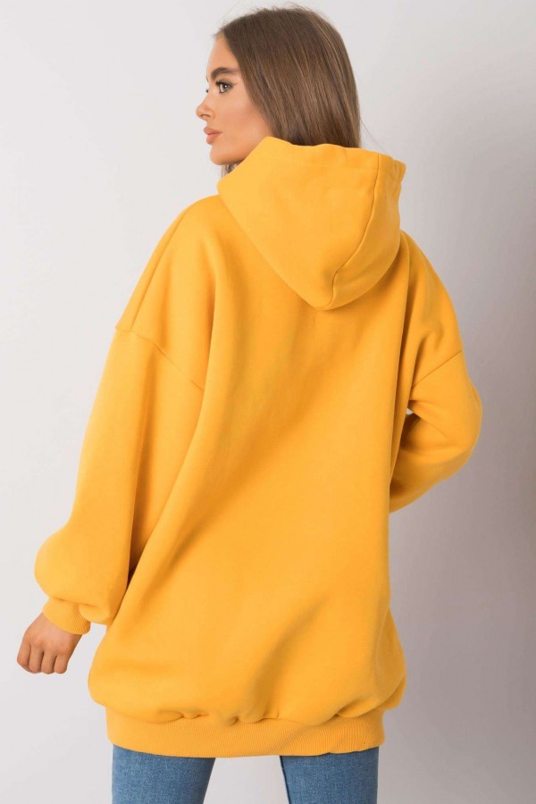 Ciepła milutka bluza tunika plus size z kapturem w kolorze żółtym Avatti 2