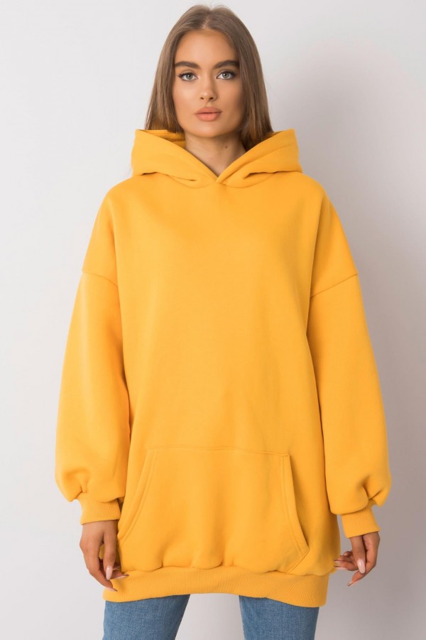 Ciepła milutka bluza tunika plus size z kapturem w kolorze żółtym Avatti 1
