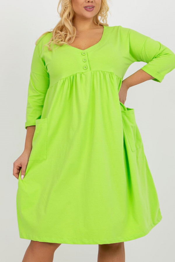 Wygodna sukienka plus size w kolorze limonkowym guziki kieszenie Tomasa