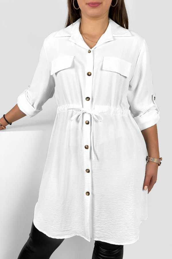 Długa koszula tunika w kolorze białym z podpinanym rękawem wiązanie w pasie Ruka