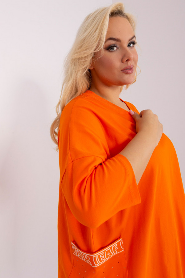 Bluzka plus size w kolorze pomarańczowym o luźnym fasonie oversize kieszenie dżety Izetta 1