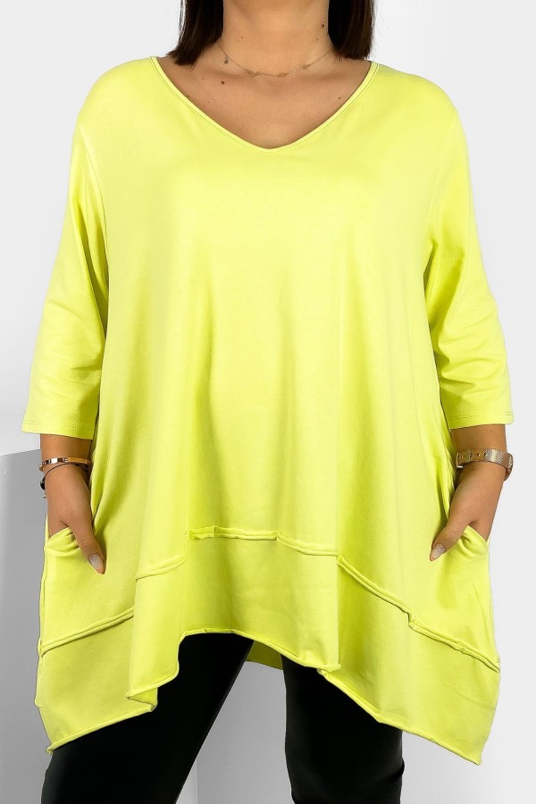 Asymetryczna tunika damska plus size w kolorze limonkowym z kieszeniami Nela