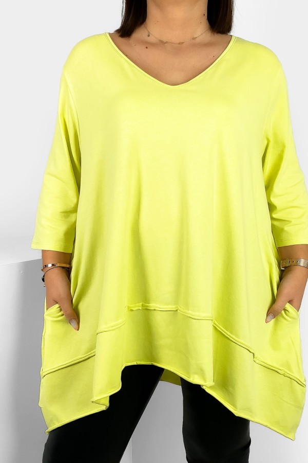 Asymetryczna tunika damska plus size w kolorze limonkowym z kieszeniami Nela 2