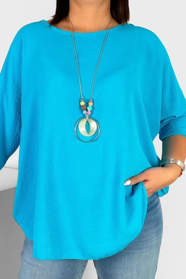 Duża koszula bluzka w kolorze turkusowym oversize podpinany rękaw z naszyjnikiem Anne