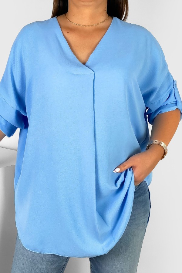 Elegancka bluzka oversize koszula w kolorze błękitnym podpinany rękaw Klee