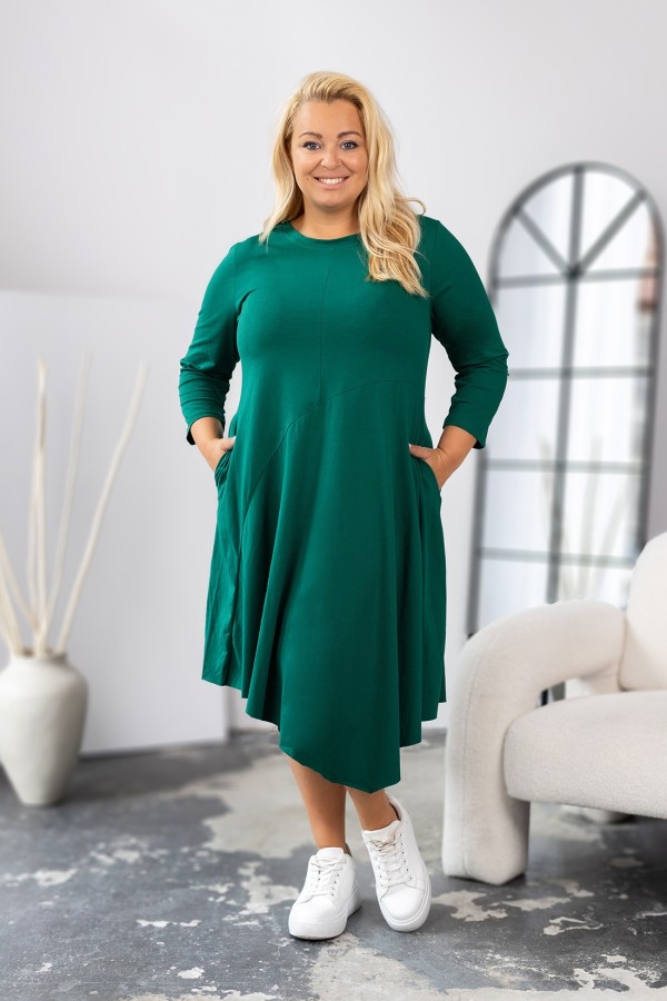 Sukienka plus size w kolorze zielonym z kieszeniami asymetryczny przód długi rękaw Shea 1